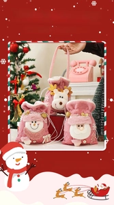 Detailed view of pink velvet Christmas gift bags featuring Santa and reindeer embroidery