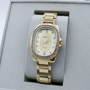 Elegant gold quartz watch for women with oval rhinestone dial and metal chain strap