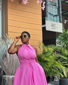 Detail of rose pink halter neck maxi dress with shirt collar and high waist design