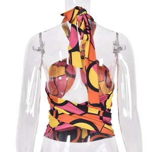 Detail of cross-back straps and geometric print on a halter crop top vest
