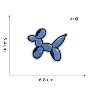 Detailed embroidery texture of blue balloon dog patch with 5.4cm x 6.8cm size markings