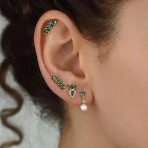 Elegant s925 silver gold-plated earring set featuring green emerald and pearl accents
