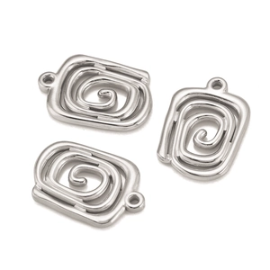 Close-up of three silver stainless steel spiral vortex charms with top loops