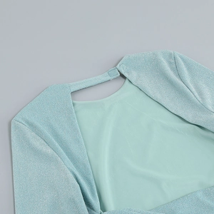 Detail of light blue glitter dress showing the back cutout and velcro closure mechanism