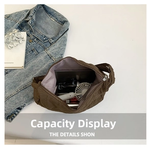 Detailed interior view of a deep brown quilted tote showing its large storage capacity