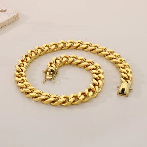 Detail of 13mm 18K gold plated stainless steel Cuban link bracelet with box clasp