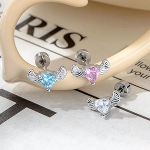 Three-piece silver wing earrings set with heart-shaped zircon in blue, pink, and white