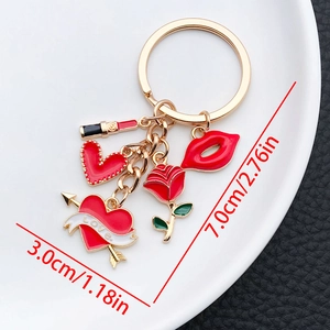 Detail view of red lips, rose and heart charms with dimensions 7.0cm and 3.0cm