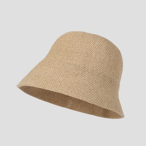 Detailed view of the fine knit texture and beige weave on a breathable sun hat