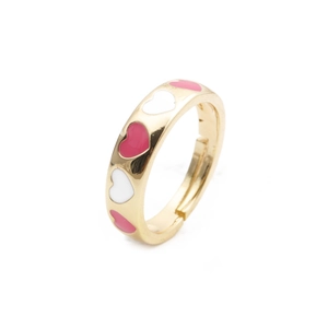 Close-up of heart-shaped pink and white enamel drip oil details on a golden open ring