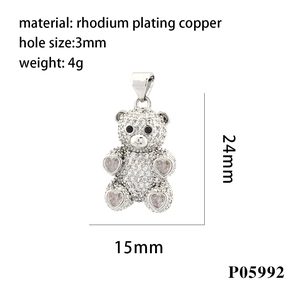 Detailed specs of silver bear pendant showing 24x15mm dimensions and clear zircon inlay