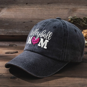 Close-up of Volleyball MOM embroidery on vintage washed cotton baseball cap texture