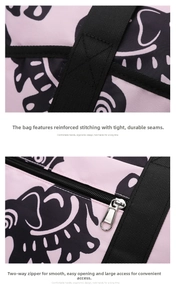 Detail of pink elephant print bag showing heavy-duty double zippers and reinforced stitching