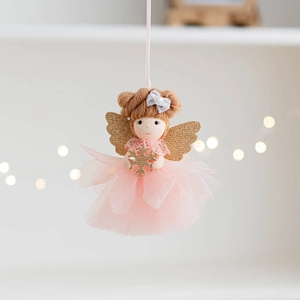 Detailed close-up of a pink tulle angel ornament with golden wings and glitter accents