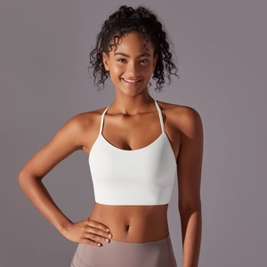 Close-up of white double-sided brushed racerback sports bra with wide elastic hem