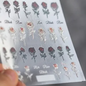 Autocollants 5D pour ongles avec motifs roses rouges et noires et contours métalliques