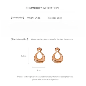 Detailed chart showing alloy geometry earrings weight 26.1g and size 5.9cm by 4cm