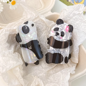 Cute panda hair claw clip set made of acetate with pearl finish and floral accents
