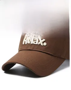 Close-up of deep brown baseball cap featuring high-quality Relax white 3D embroidery