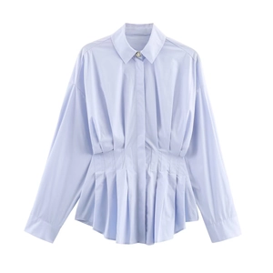 Light blue pleated poplin shirt with long sleeves and slimming waist detail on white background