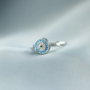 Adjustable S925 sterling silver evil eye ring with rotating blue and white zircon stones