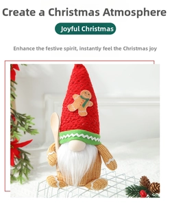Detail of Christmas gnome plush with gingerbread hat and wooden spoon decoration