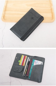 Deep grey RFID travel wallet details showing card slots and elastic closure strap