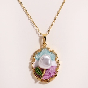 Detail of elegant gold necklace featuring enamel flower pendant and natural pearl