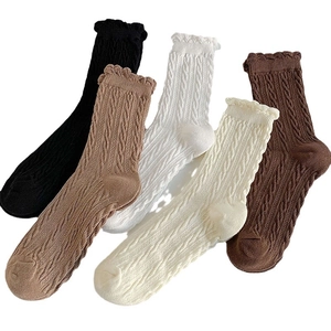 5 pairs of women's cable knit mid-calf socks with ruffle trim in neutral autumn colors