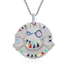 Close-up of hip-hop cartoon monster pendant with sparkling colorful stones and silver chain