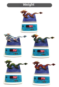 Detailed comparison of Chinese dragon figurines in various colors showing weight accuracy