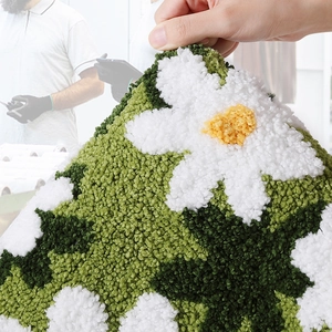 3D floral tufted bathroom mat with soft green base and white flower petals