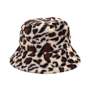 Plush leopard print bucket hat with warm faux fur material for a stylish winter look