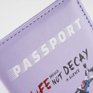 Macro shot of purple leather passport cover with Life Should Not Decay In Silence text