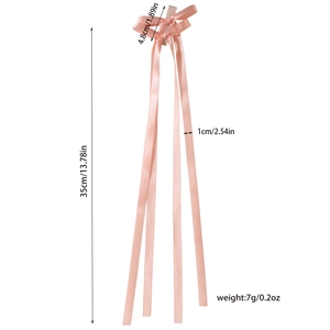 Pink silk ribbon bow hair clip with long streamers on white background and dimensions