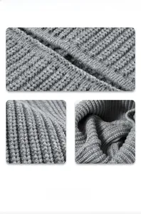 Close-up of gray thick ribbed knit texture on a winter beanie for men and women