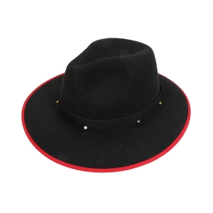 Close-up of black wide-brim fedora hat with red edge trim and pearl bead accents