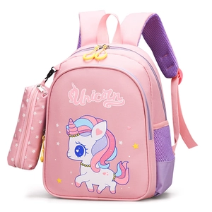 Pink unicorn kids backpack with padded mesh straps and matching small star coin purse charm