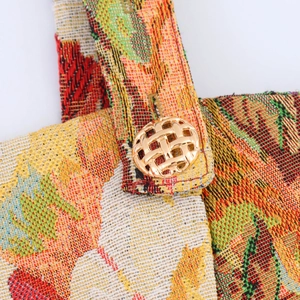 French vintage style oil painting dress with colorful woven fabric and gold metal button