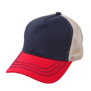 Detail of multi-color mesh truck cap showing wavy stitching and breathable back panels