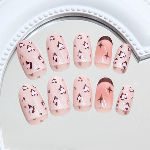 French blush pink leopard cat-eye oval press-on nails with star patterns and mirror reflection