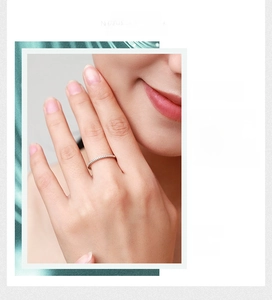 Detail of s925 silver pavé ring featuring sparkling cubic zirconia on a slender band