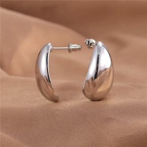 Minimalist silver teardrop earrings with a high-shine metallic finish for women