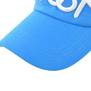 Macro shot of sky blue cotton cap showing high-density white 3D embroidery and stitching