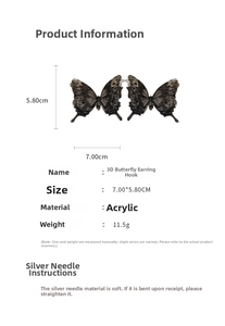 Detail view of large 3D acrylic butterfly earrings with dimensions 7x5.8cm and silver pins