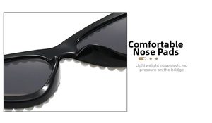 Detail of comfortable integrated nose pads on black pearl-decorated sunglasses