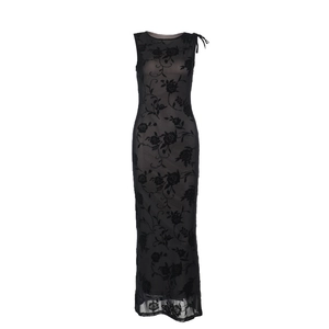 Close-up of semi-transparent black mesh fabric with elegant flocked floral texture