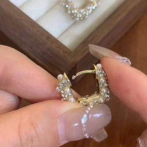 Elegant gold-plated hoop earrings with micro-set pearls and sparkling rhinestones