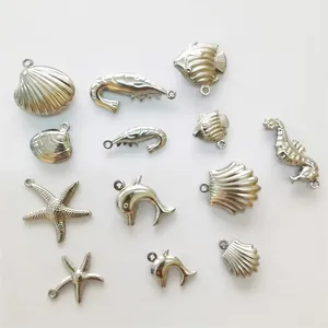 Various stainless steel ocean themed hollow pendants with precise size measurements