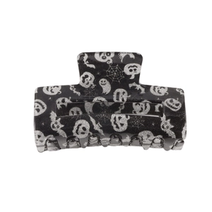 Black Halloween claw clip with silver spider web, ghost, and bat patterns for festive hair